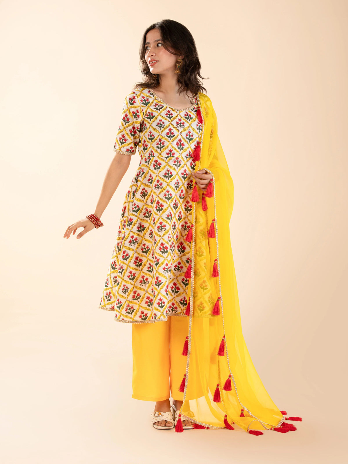 Flowy yellow anarkali that hides tummy bulge for plus size curvy women